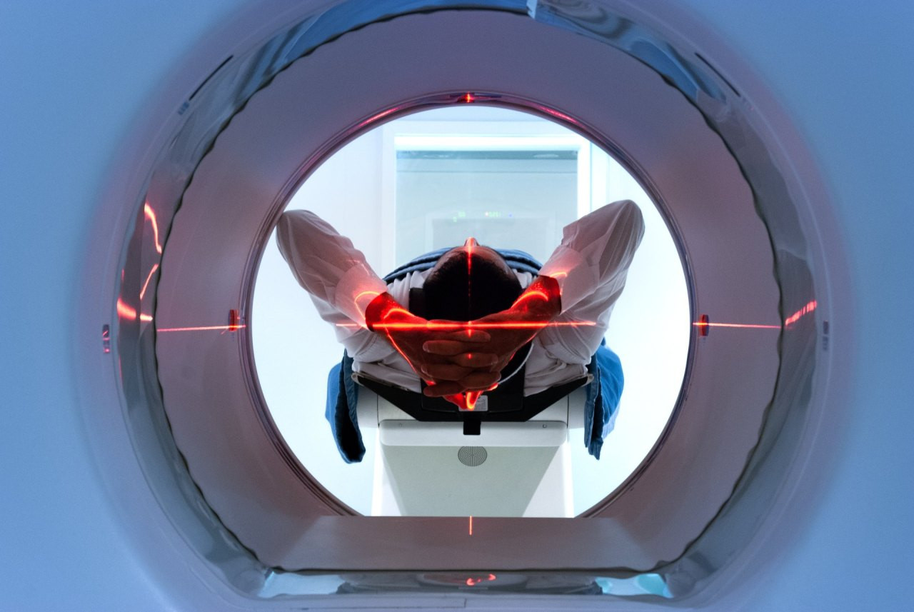 patient entering an MRI machine to produce a detailed and intern