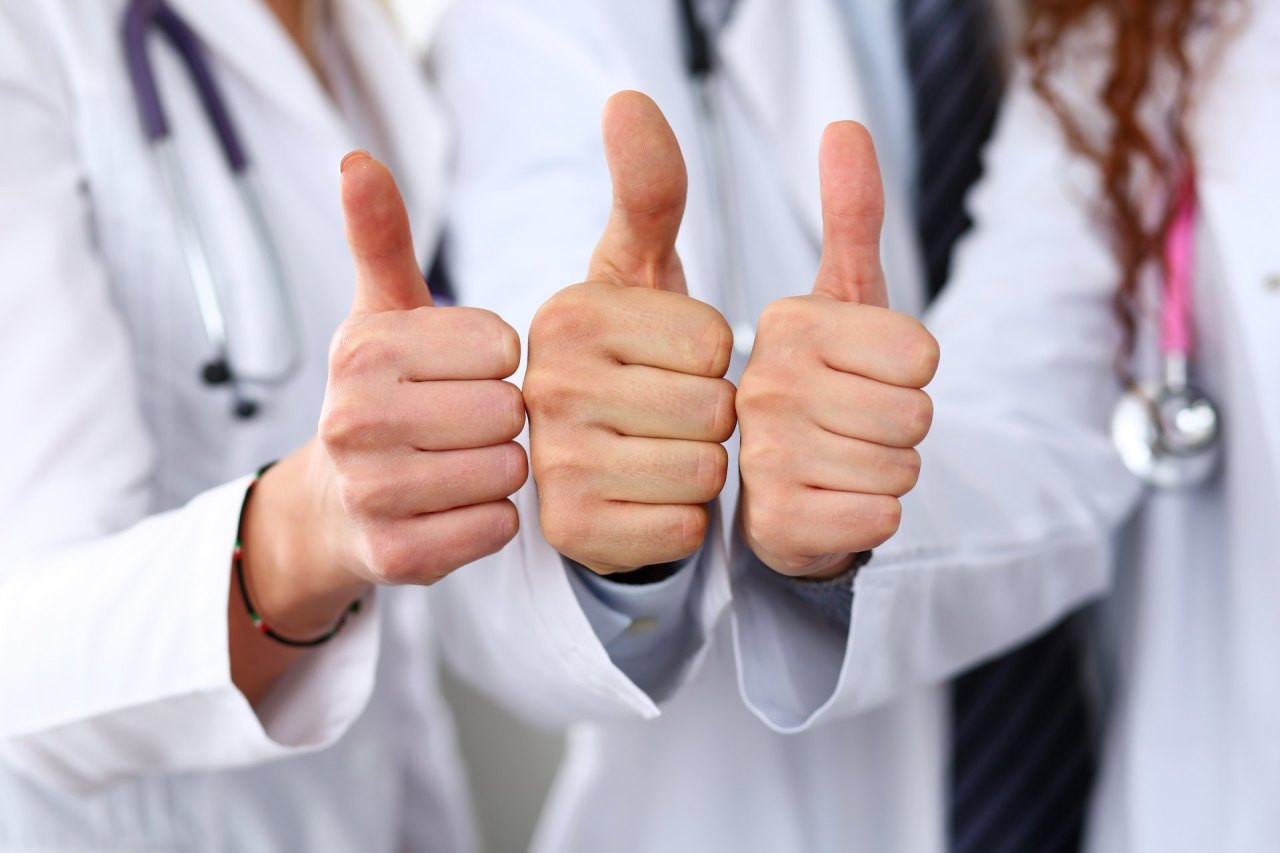 Group of doctor hands show OK or confirm sign