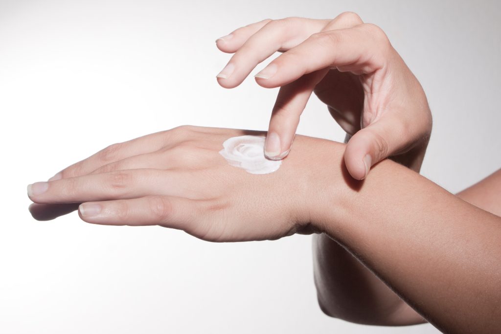 woman hands with vanishing creme
